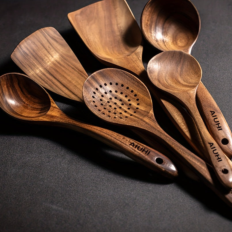 Set of wooden spoons and kitchen utensils 