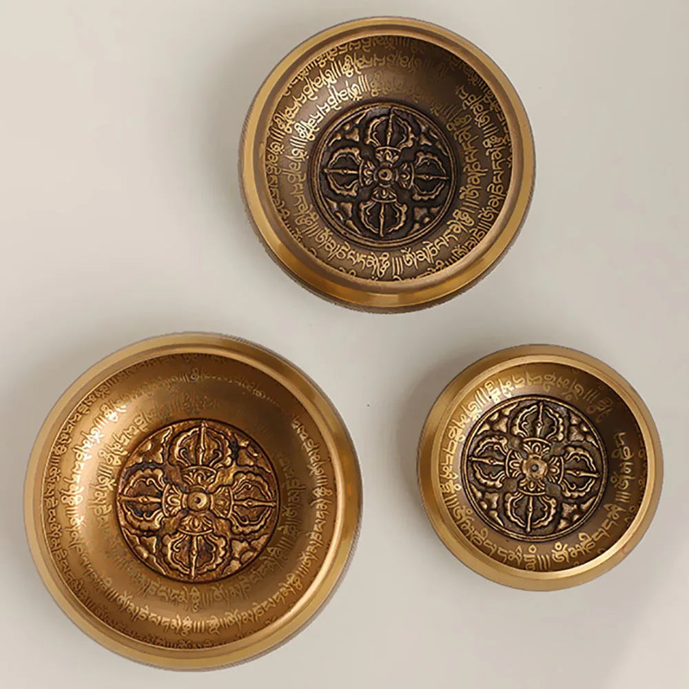 Set of copper Tibetan singing bowls for meditation and yoga 