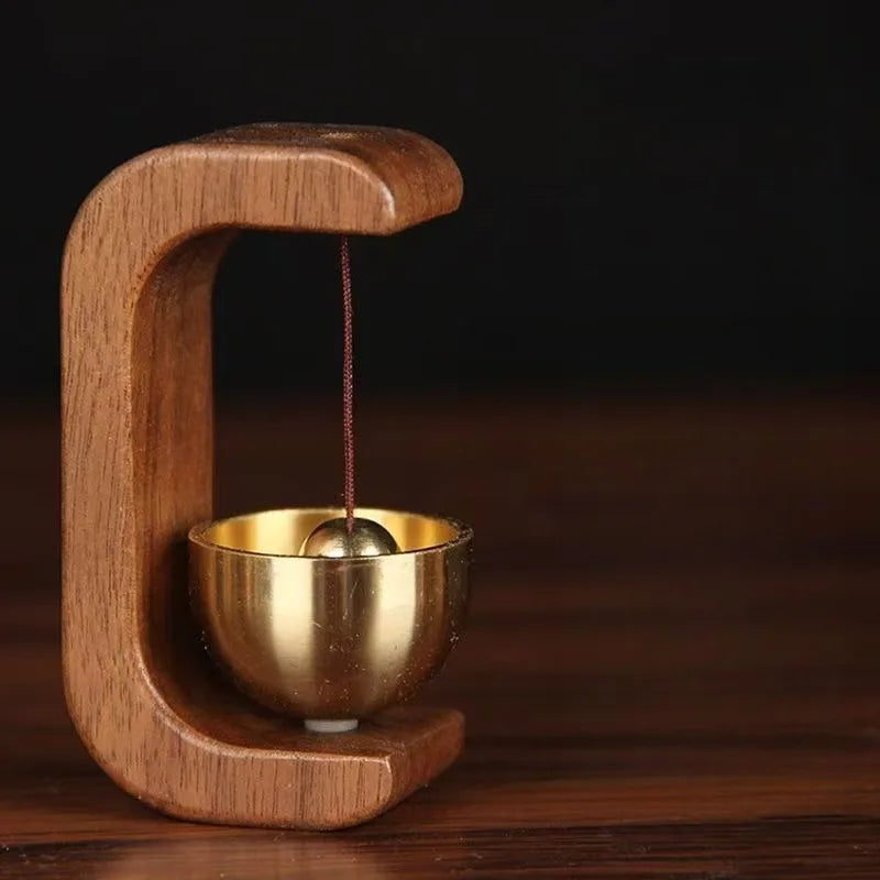 Campana de viento de latón y madera para decoración moderna